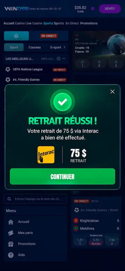 Capture d’écran Wintari Sports montrant une notification de retrait réussi de 75 $ via Interac, avec un bouton « Continuer », sur l’interface de paris sportifs.